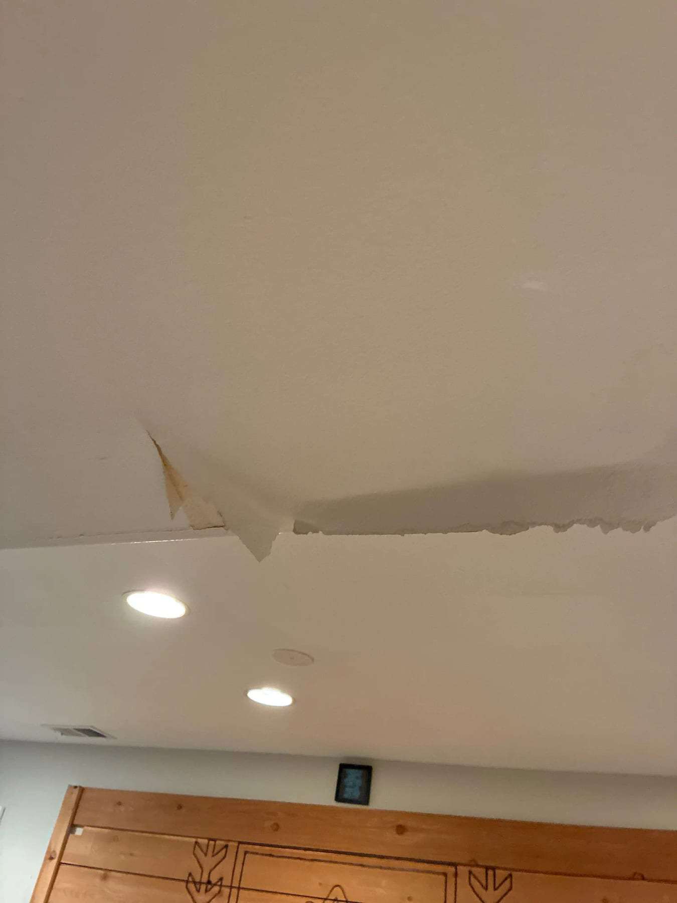 Ceiling drywall sagging and peeling after water came through