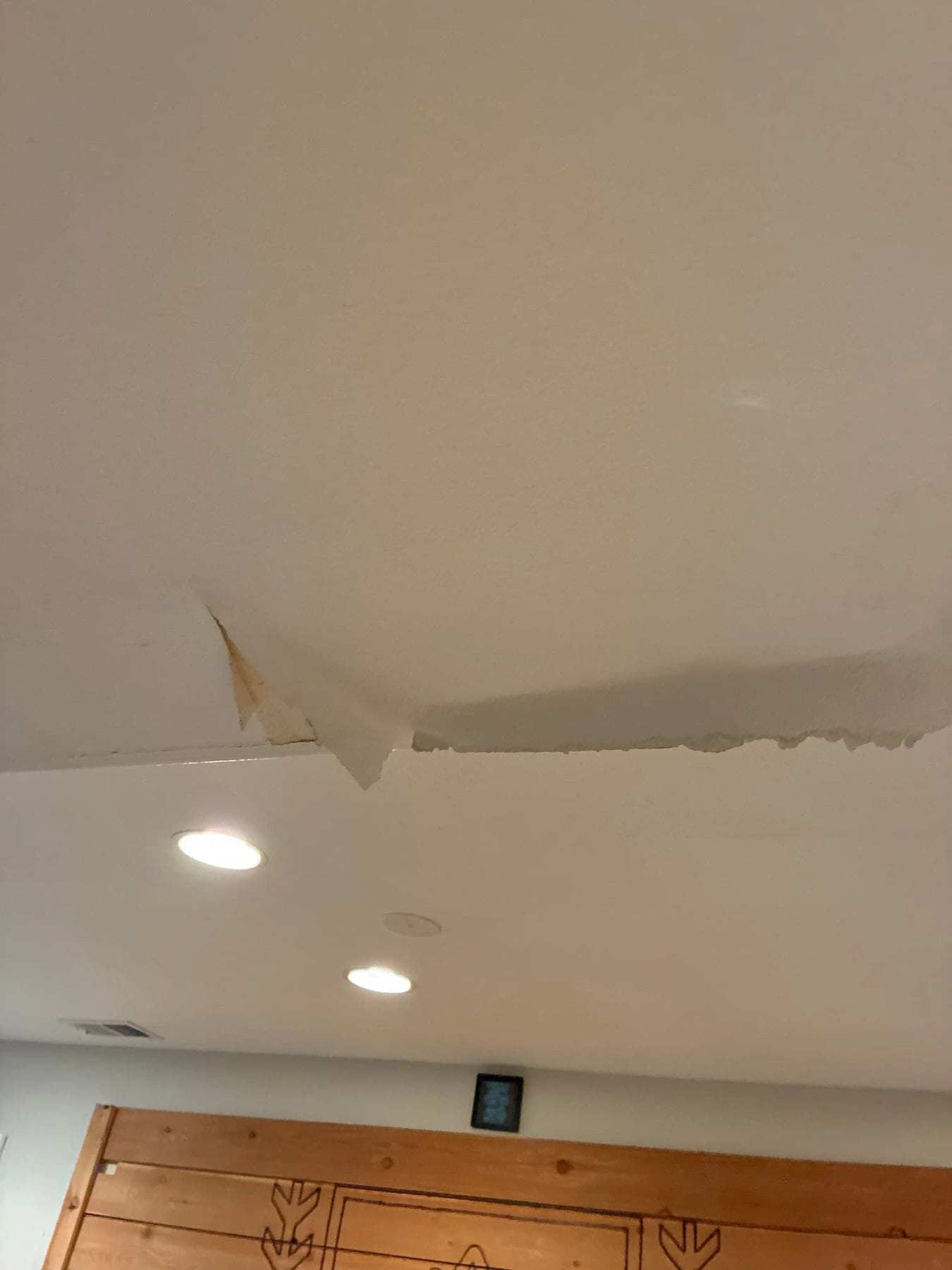 Ceiling drywall sagging and peeling after water came through